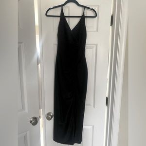 Shimmer black mid length with a slit. Worn once; like new